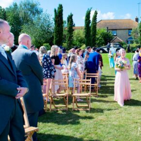 Bridesmaids in ceremony at Notley Tythe Barn wedding