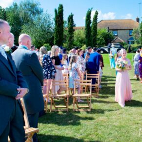 Bridesmaids in ceremony at Notley Tythe Barn wedding