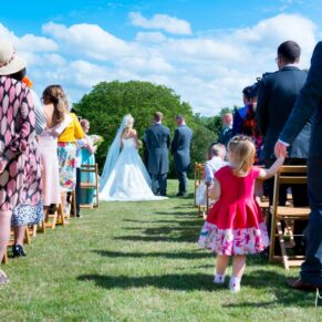 Guests in the garden at Notley Tythe Barn wedding