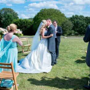 Bride and groom in the garden at Notley Tythe Barn wedding