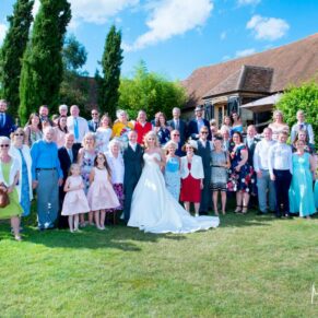 Notley Tythe Barn wedding large group pose