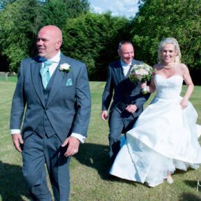 Walking through the grounds at Notley Tythe Barn wedding