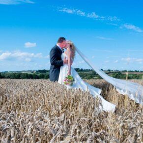 Romantic pose outdoors at Notley Tythe Barn wedding