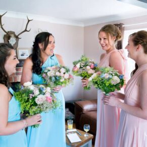 Bridesmaids getting ready at Notley Tythe Barn wedding