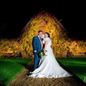 Waddesdon Dairy winter wedding photograph in the courtyards at dusk
