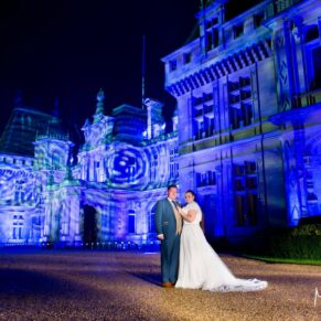 Waddesdon Dairy winter wedding photograph with the Christmas illuminations at the manor