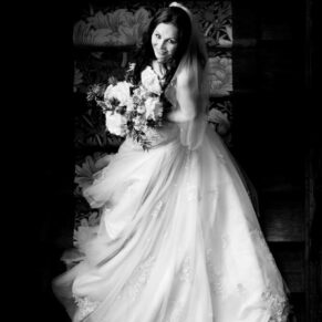Asian wedding photography of the bride on the staircase in her Buckinghamshire hotel