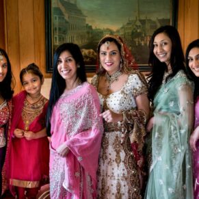 Asian wedding photography small group pose at Waddesdon Dairy in Buckinghamshire