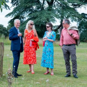 Taplow Court wedding photography of guests in the grounds chatting