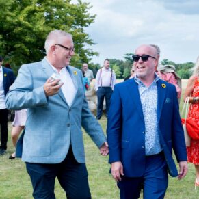 Taplow Court wedding photography of guests enjoying the banter