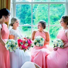 Hartwell House wedding photographs of the bride with her bridesmaids pre ceremony