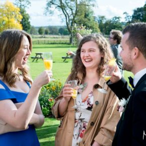 Missenden Abbey wedding pictures of the guests enjoying the banter
