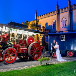 Missenden Abbey wedding pictures of the newlyweds with their amazing transportation for the day