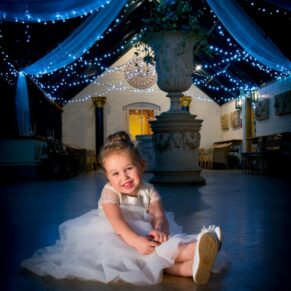 Photography of adorable flower girl at Buckinghamshire winter wedding