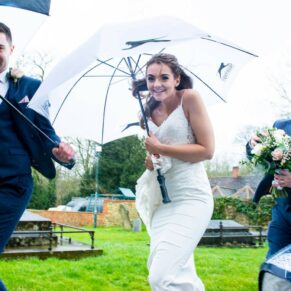 Photography of bride Braving the winter storm at Buckinghamshire wedding