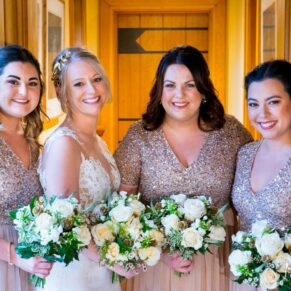 Waddesdon Dairy winter wedding photography of the bride with her bridesmaids