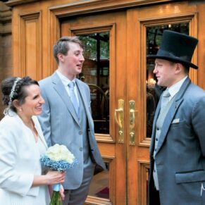Photography of the newlyweds being greeted at the Landmark Hotel - Marylebone London wedding