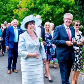 Guests walking along at St Mary's Chesham Church wedding