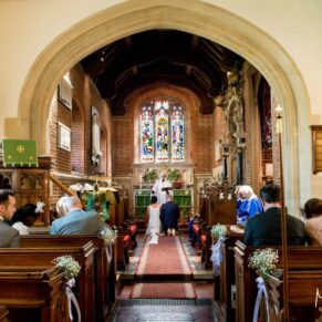Service in progress at St James Church Fulmer wedding