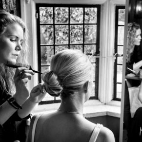 Photograph of the hair stylist working at this Crown Hotel Amersham wedding