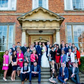 Family group pose at Dorton House wedding
