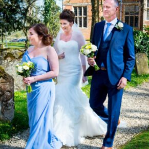 The bride arriving at the wedding chapel at Dorton House