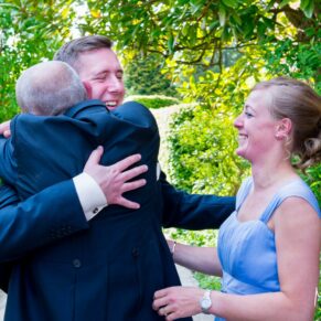 Photos at Dorton House of wedding hugs for the the groom