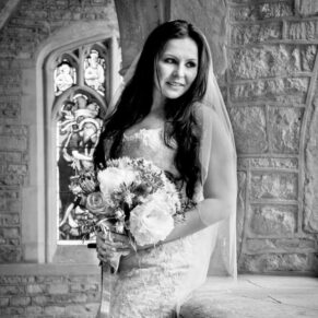 Dramatic bridal portrait at St Giles Church wedding - Standlake