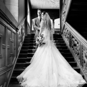 Eynsham Hall wedding photographs on the grand staircase