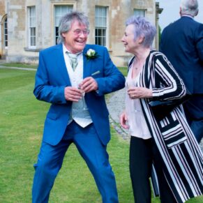 Enjoying the banter at Hartwell House Hotel wedding