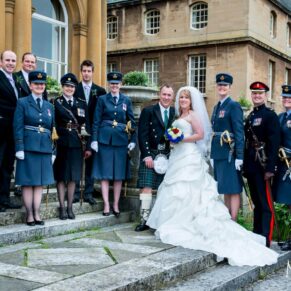Group picture outside Halton House wedding