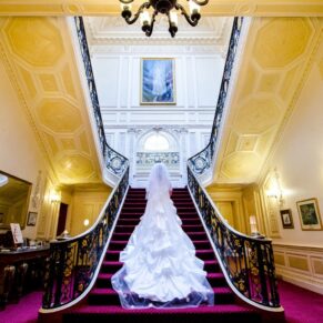 Halton House wedding pose on the grand staircase