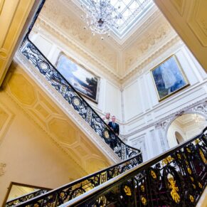 Halton House wedding pose on the staircase