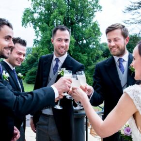 Enjoying the banter at Taplow House Hotel wedding