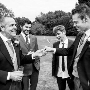 Candid moment at Taplow House Hotel wedding
