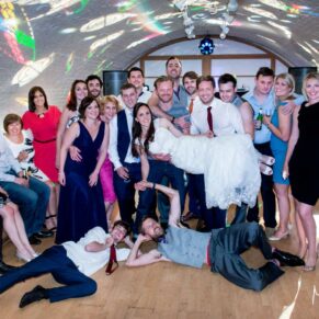 Taplow House Hotel wedding group pose on the dancefloor