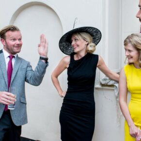 Guests enjoy the banter at Taplow House Hotel wedding