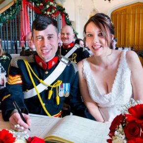 Signing of the register at Missenden Abbey military wedding