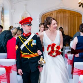 Leaving the ceremony at Missenden Abbey military wedding