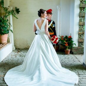 Stunning flowing gown at Missenden Abbey military wedding