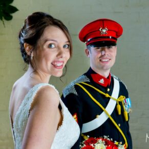 The newlyweds in the Summerhouse at Missenden Abbey military wedding