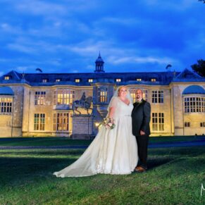 Dusk pose of the newlyweds at their Hartwell House autumn wedding