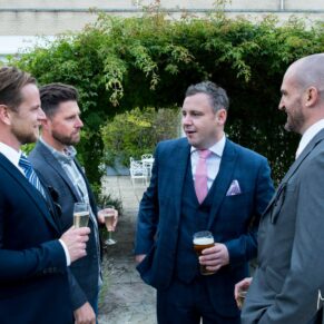 A candid photography capture of these lads during the wedding drinks reception at Sopwell House