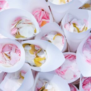 Closeup photography of the colourful confetti before it was showered over the newlyweds at their Bay Tree Hotel wedding in Burford