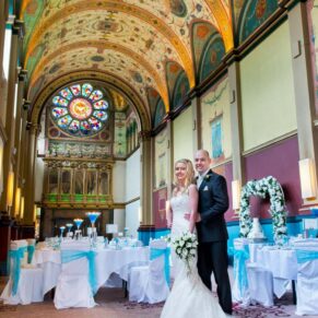 Photography of the newlyweds in the historic chapel prior to the wedding breakfast at their Beaumont Estate Berkshire venue