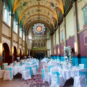 Photography of the vast chapel interiors and wedding breakfast setup at this the Beaumont Estate wedding venue in Windsor