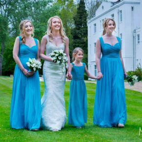 The ladies taking a stroll at this Beaumont Estate summer wedding whilst giggling at someone away in the distance who is making them laugh