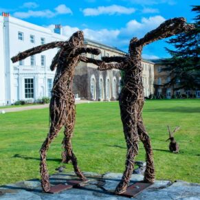 The willow hares fighting on the lawns at this fabulous Old Windsor wedding venue