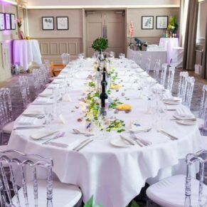 The grand banqueting table setup for a wedding breakfast