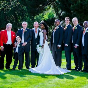The bride and the lads with the toastmaster in the reception gardens